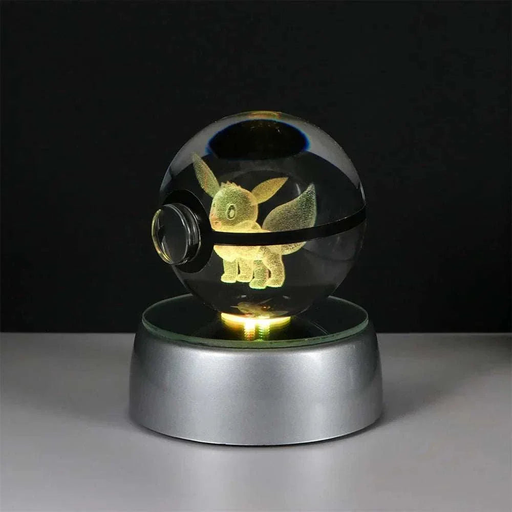 Eevee Pokémon Crystal Ball on LED light base, perfect for home decor and kid's birthday gifts.