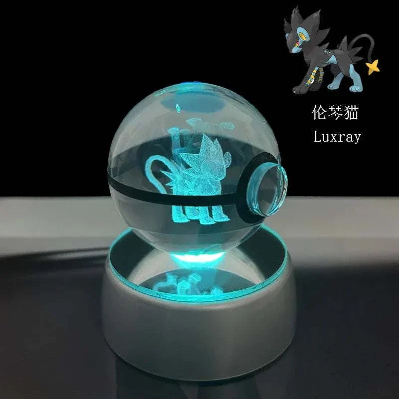 Pokemon Crystal Ball with Luxray glowing on LED base.