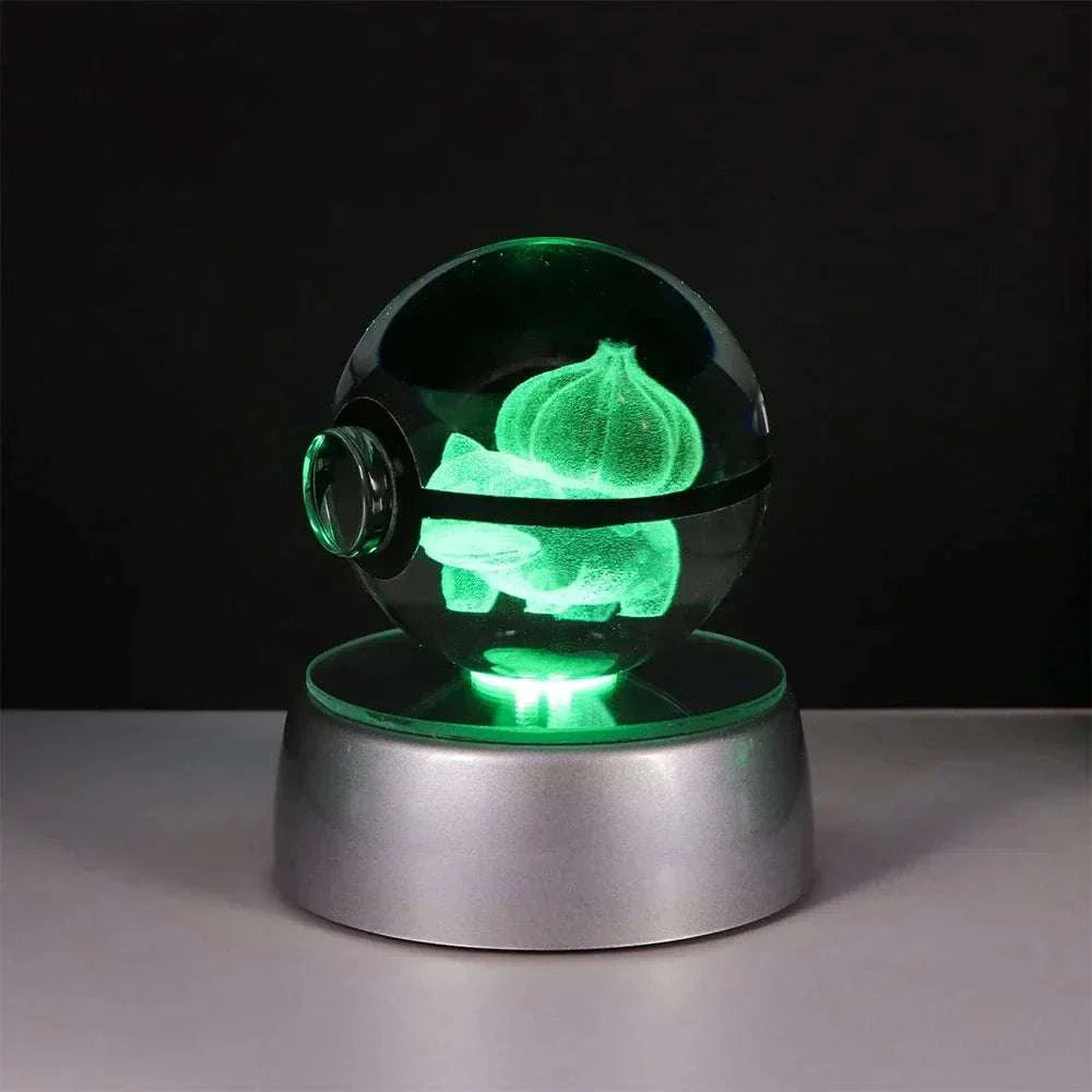 Pokemon Crystal Ball with LED base, featuring Pikachu and other characters, glowing in multi-color light. Perfect for kids' room decor.