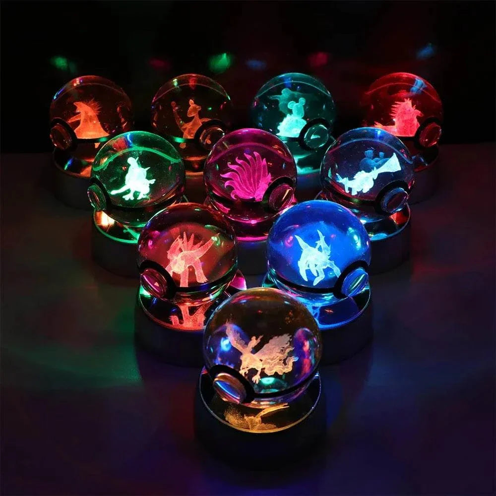 Colorful LED-lit Pokémon Crystal Balls featuring Pikachu, Gengar, Eevee, Mewtwo, and Lucario on display.