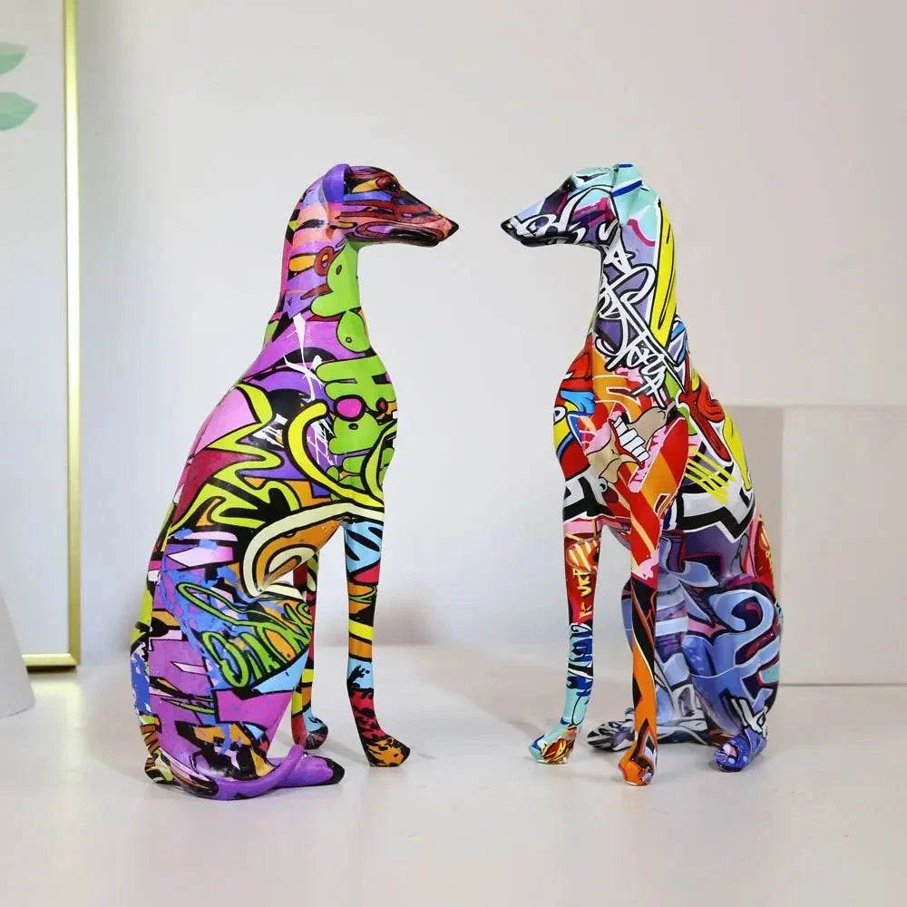 Modern creative painted colorful greyhound Doberman resin decorations on a desktop.