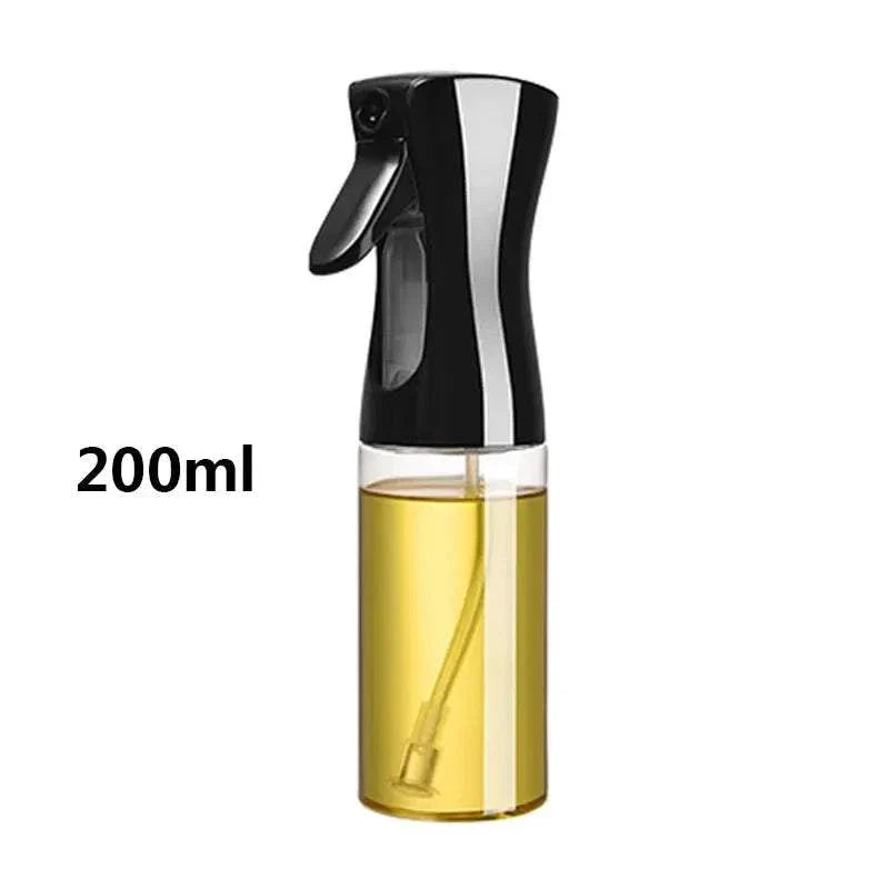200ml oil spray bottle with black nozzle, transparent body showing olive oil level, ideal for cooking and baking.