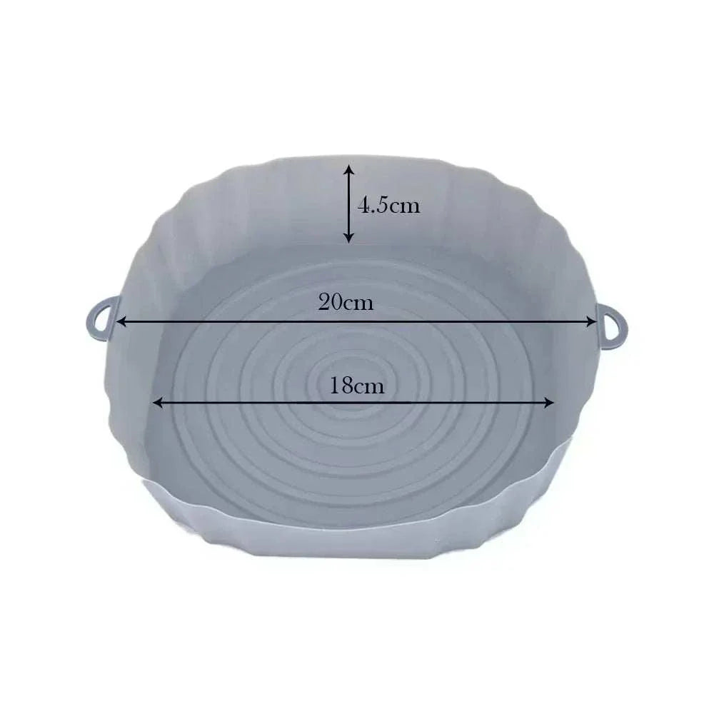 Silicone air fryer liner with side handles, 20cm diameter, reusable baking accessory.