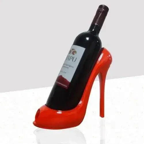 Creative high-heeled shoe wine rack in red for living room decoration.