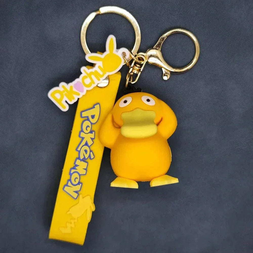 Yellow Pokémon keychain featuring Pikachu and Psyduck charms with decorative ribbon.