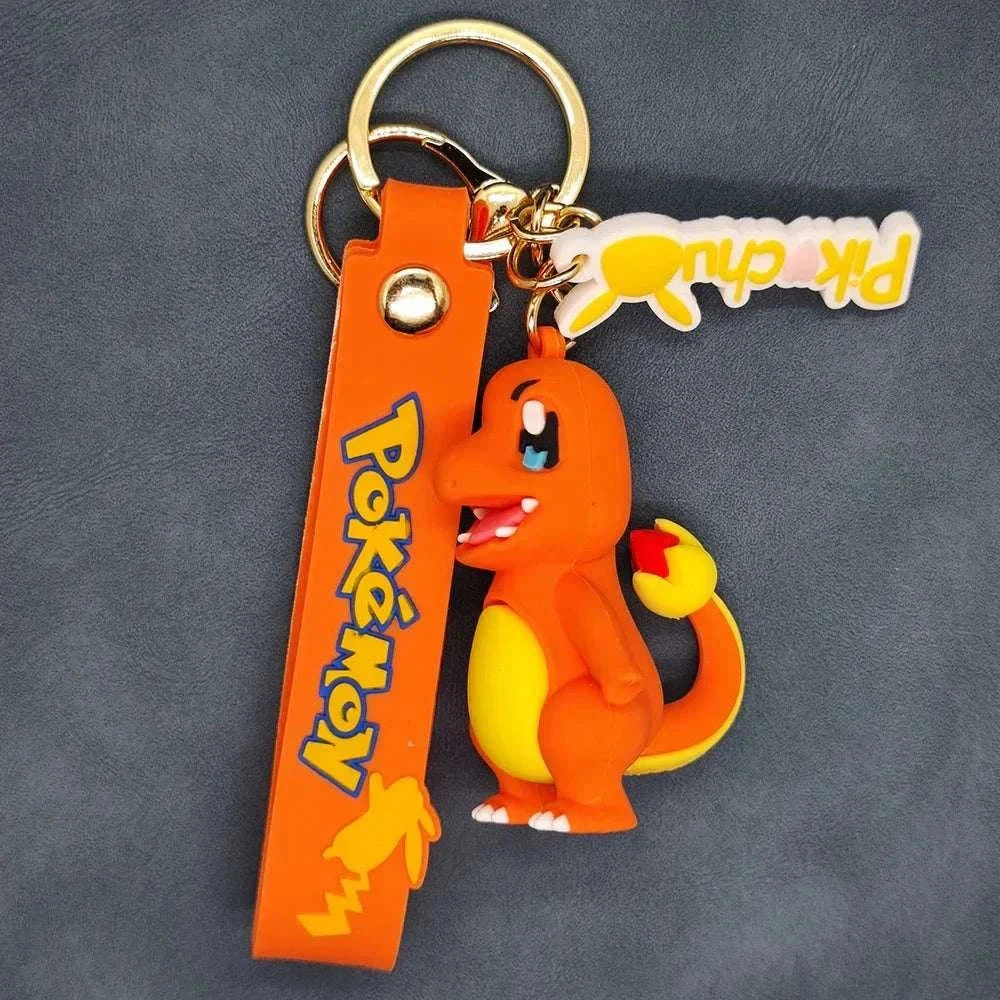 Colorful Pokemon keychain featuring a Charmander, with a Pokéball and "Pokemon" text, made from durable silicone.