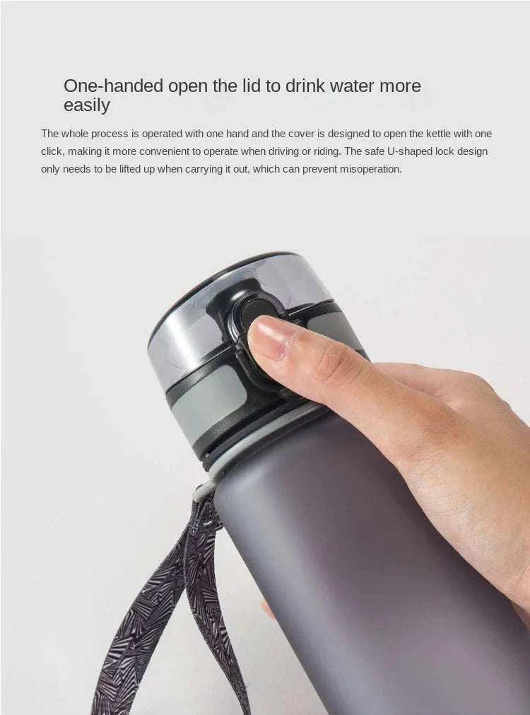 560ML Pokemon Water Cup with easy-open lid and strap for outdoor sports.