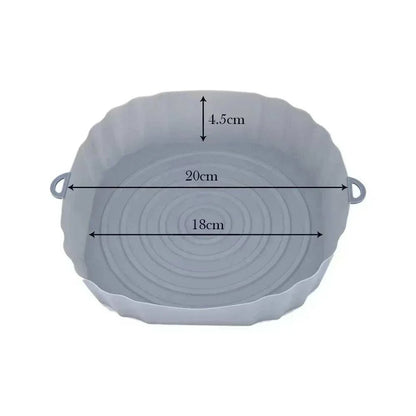 Silicone air fryer liner with side handles, 20cm diameter, reusable baking accessory.