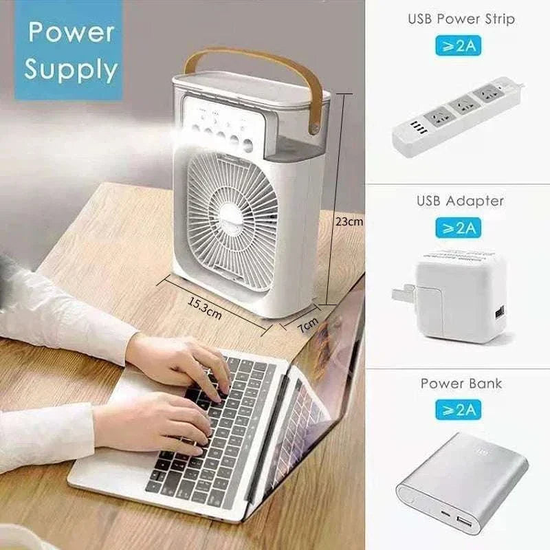 Portable 3-in-1 fan air conditioner and humidifier with LED light, shown on a desk beside a laptop, USB power supply options displayed.