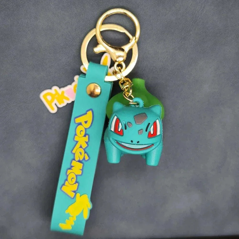 Colorful Pokemon keychain featuring a cute character figurine, perfect for fans and daily use.