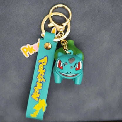 Colorful Pokemon keychain featuring a cute character figurine, perfect for fans and daily use.
